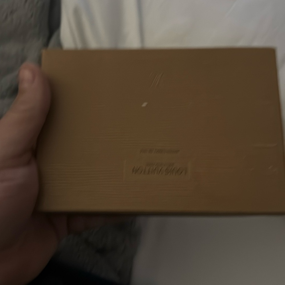 Men’s vintage Louis Vuitton wallet never been used still in package
